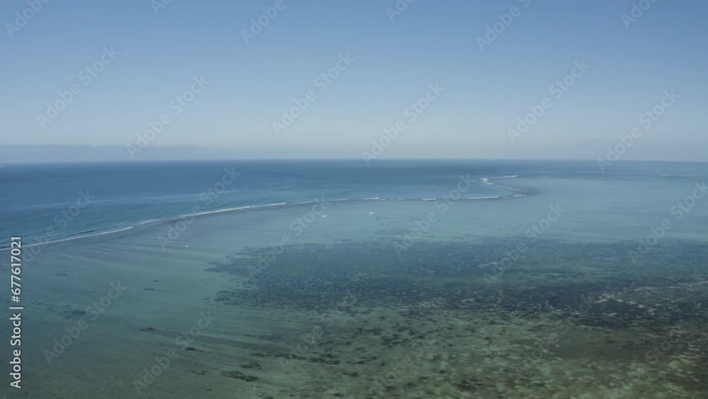 Aerial view of the barrier reef coastline in Flic En Flac, Riviere Noire, Mauritius Island. Aerial view of the barrier reef coastline in Flic En Flac, Riviere Noire, Mauritius Island.