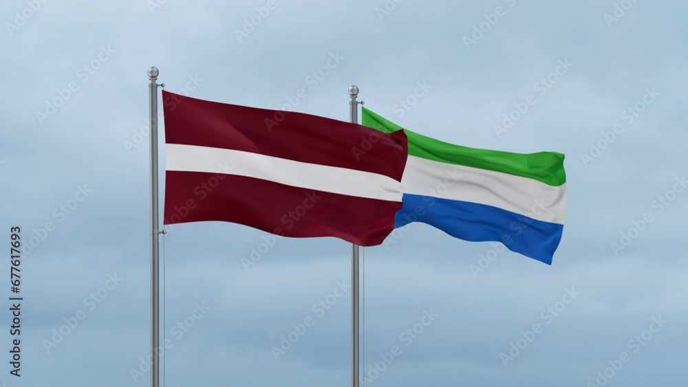Sierra Leone or Salone and Latvia flag waving together on cloudy sky, endless seamless loop, two country cooperation concept Sierra Leone or Salone and Latvia flag waving together on cloudy sky, endless seamless loop, two country cooperation concept