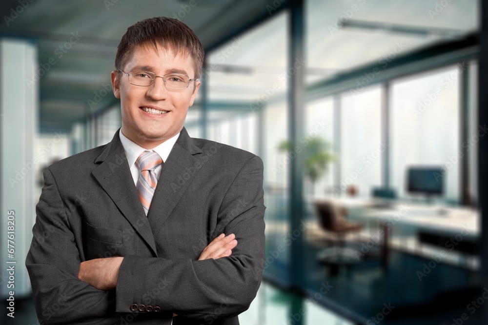 Happy confident business man professional with arms crossed Happy confident business man professional with arms crossed