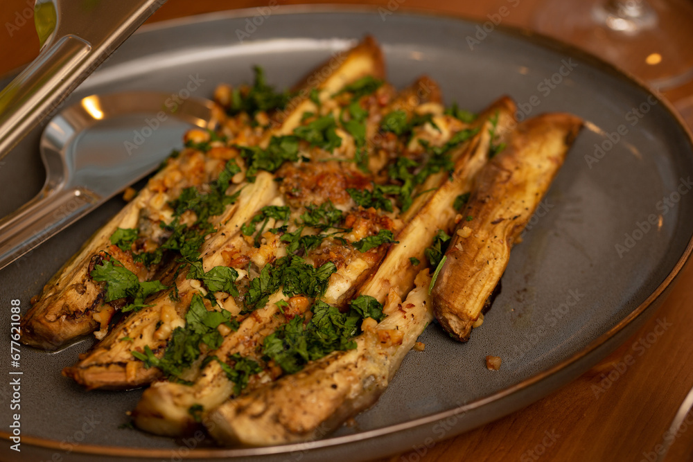 Baked eggplant with garlic, nuts and herbs Baked eggplant with garlic, nuts and herbs