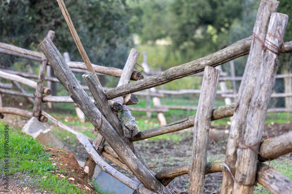 Rustic wooden fence in the countryside details Rustic wooden fence in the countryside details
