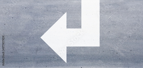 arrow sign on the street road © skandar