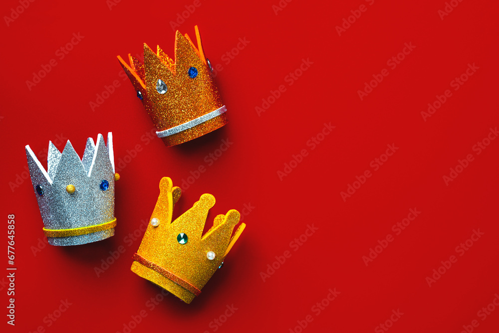 Three crowns of the three wise men with copy space. Concept for Reyes Magos day. Three Wise Men concept - obrazy, fototapety, plakaty 