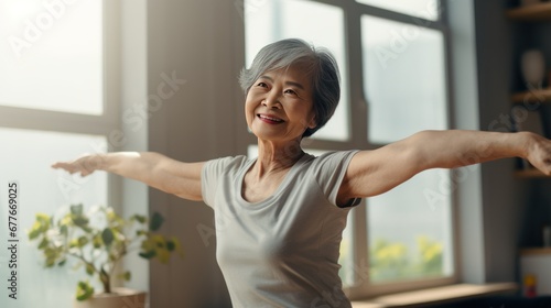 Portrait of Asian senior age woman exercising at home ,Elderly people and health