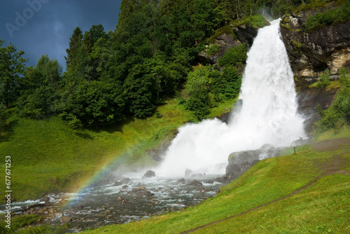 Steinsdalsfossen waterfall in the village of Steine  Norway