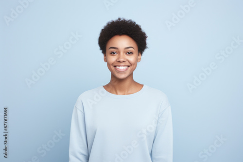 Radiant African American Woman in Blue Sweater Smiling