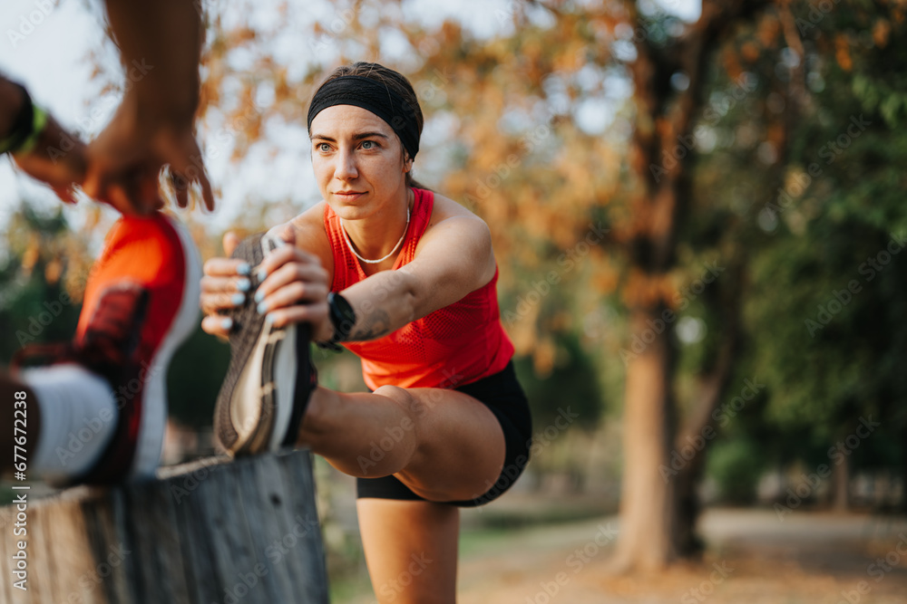 Fototapeta premium Athletes practice cardio in natural park environment.