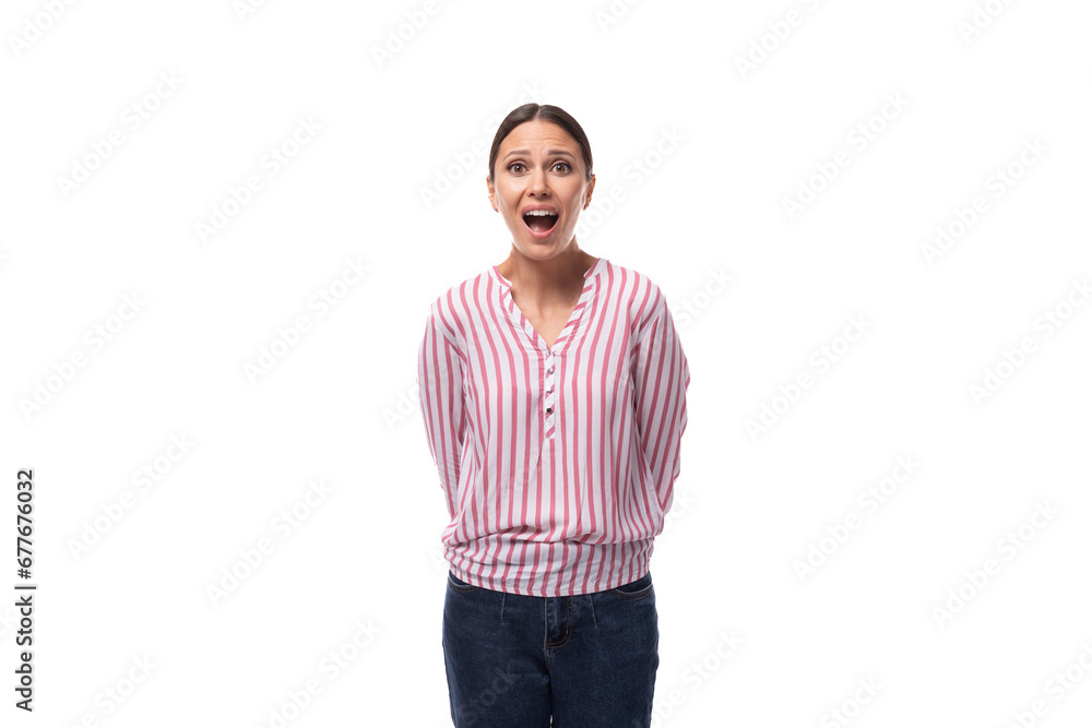 young charismatic caucasian woman with black hair gathered in a ponytail wearing a striped blouse young charismatic caucasian woman with black hair gathered in a ponytail wearing a striped blouse