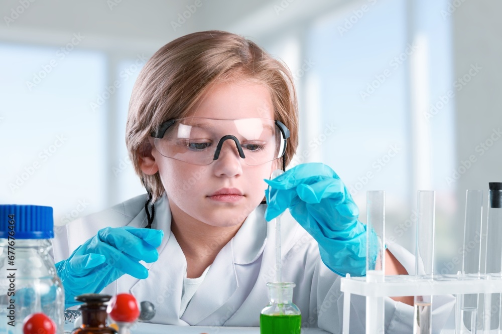 Science student do experiments in the modern laboratory at school Science student do experiments in the modern laboratory at school