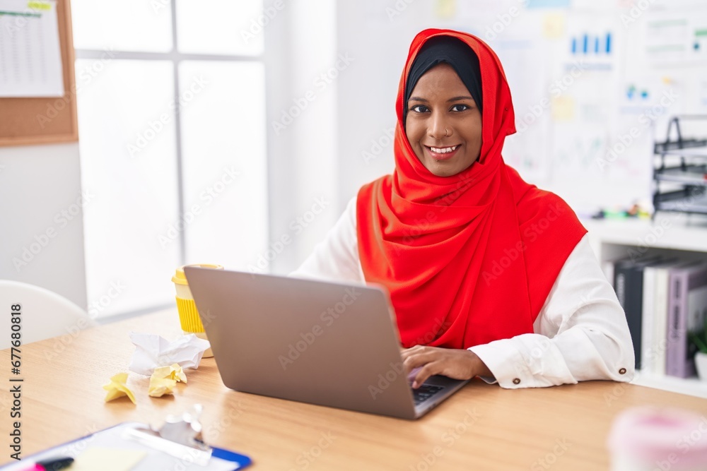 Young beautiful woman business worker using laptop working at office Young beautiful woman business worker using laptop working at office