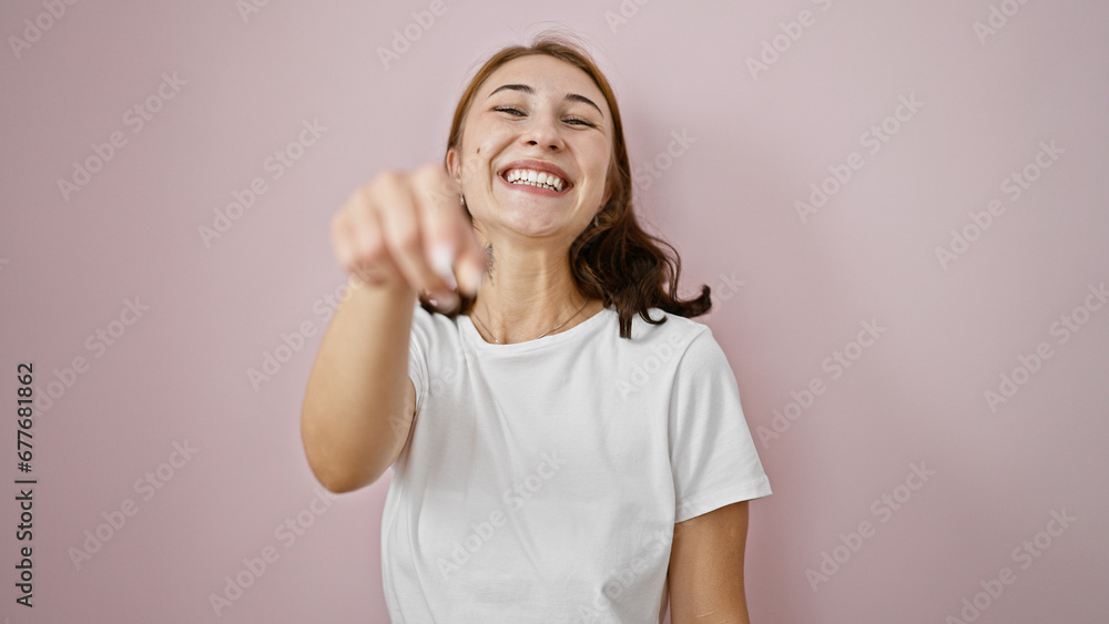 Young woman smiling confident standing over isolated pink background Young woman smiling confident standing over isolated pink background