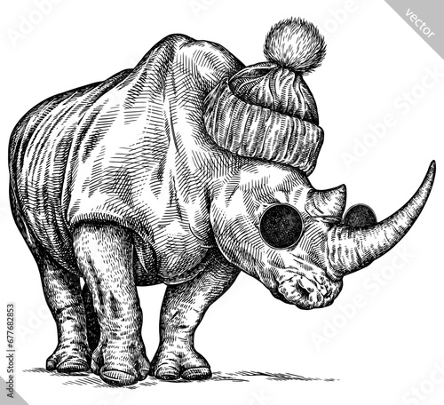Vintage engraving isolated rhinoceros glasses dressed fashion set illustration ink sketch. Africa background rhino silhouette sunglasses hipster hat art. Black and white hand drawn vector image