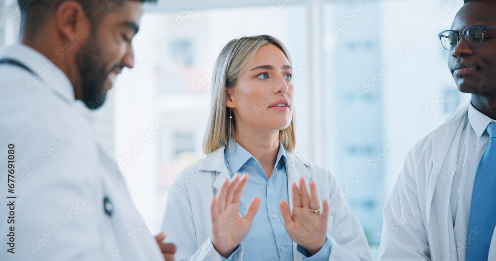 Fototapeta premium Group conversation, doctors meeting or woman planning, brainstorming or collaboration in medical clinic. Communication, leader or team surgeon, nurses or expert consulting on problem solving solution