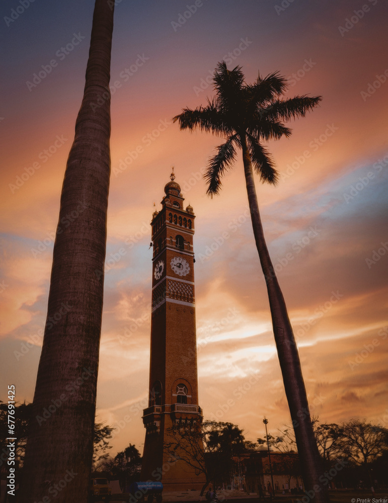 Famous Indian  clock tower architecture in the evening time with susnet light 