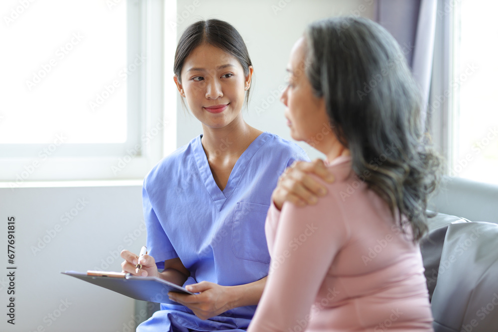 Senior woman with neck and shoulder pain visits doctor at hospital for diagnosis and treatment. Senior woman with neck and shoulder pain visits doctor at hospital for diagnosis and treatment.