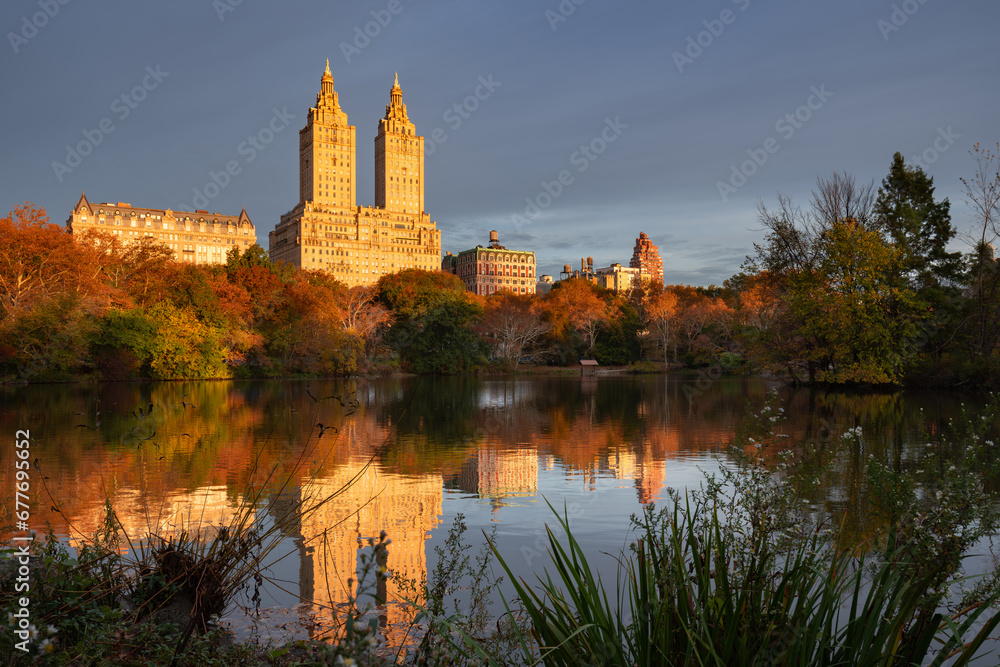 Central Park West Historic District by the lake on autumn morning. Upper West Side of Manhattan. New York City