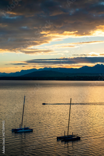 sunset with sailboat on the Geneva lake, Switzerland