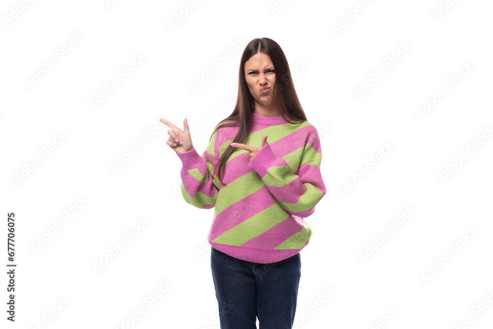 pretty 35 year old feminine model woman dressed in a pink stylish pullover announces the news actively gesticulating pretty 35 year old feminine model woman dressed in a pink stylish pullover announces the news actively gesticulating