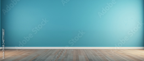 interior with an empty blue wall and wooden floor photo