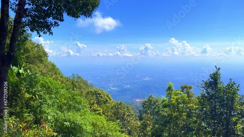 Panorama view of Chiangmai Chiang Mai city taken from Doi Suthep Mountains. Lovely views of the Old city at Sunset Sunrise lovely tropical mountains and beautiful nature in the foreground photo