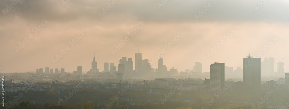 Moody sky over skyscrapers in city center, Warsaw aerial landscape