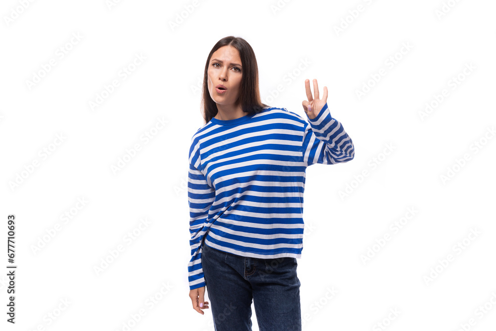 smart young stylish woman with straight hair dressed in a striped sweater smart young stylish woman with straight hair dressed in a striped sweater