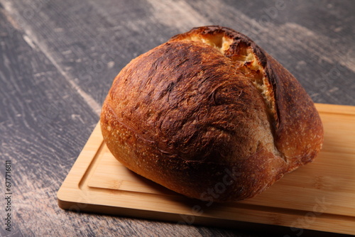 fresh round bread on a board