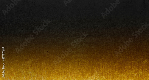 gradient background of dark black and shiny gold fabric wallpaper looks like metal use as background. texture for luxury, rich mood and tone. modern black backdrop concept for deluxe design. photo