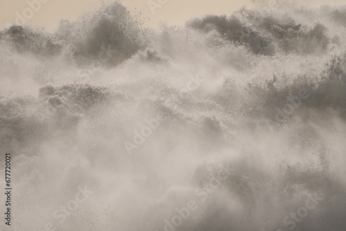high sea, crashing waves, turbulent ocean, abstract nature background showing spring tide close up