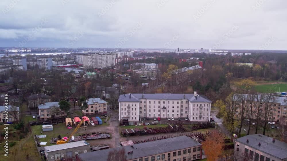 Areal view of city districts in Riga, Latvia. Apartments and streets mostly build during soviet era. East europe. Autumn, rainy day. Areal view of city districts in Riga, Latvia. Apartments and streets mostly build during soviet era. East europe. Autumn, rainy day.