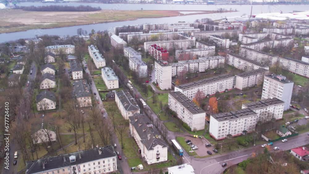 Areal view of city districts in Riga, Latvia. Apartments and streets mostly build during soviet era. East europe. Autumn, rainy day. Areal view of city districts in Riga, Latvia. Apartments and streets mostly build during soviet era. East europe. Autumn, rainy day.