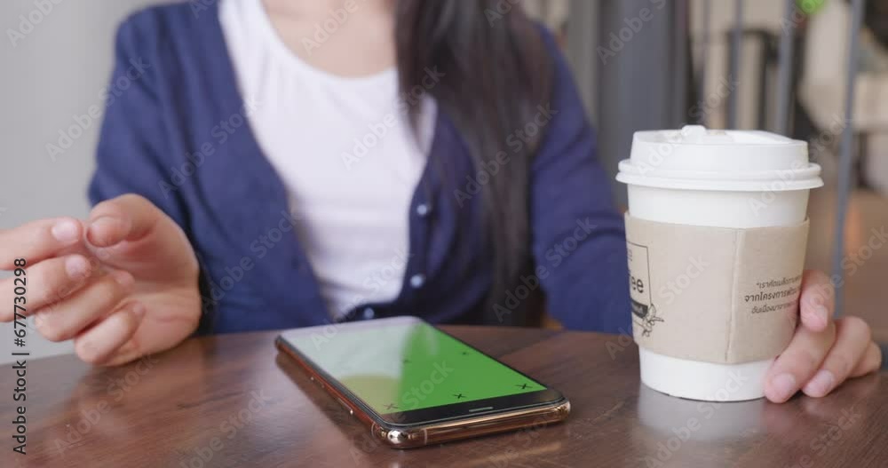 Woman wearing casual clothes video chatting with friends via online system Woman wearing casual clothes video chatting with friends via online system