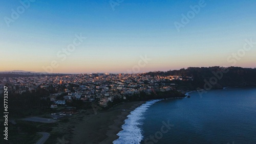Scenic drone shot of residential buildings near the baker beach of San Francisco in California, USA