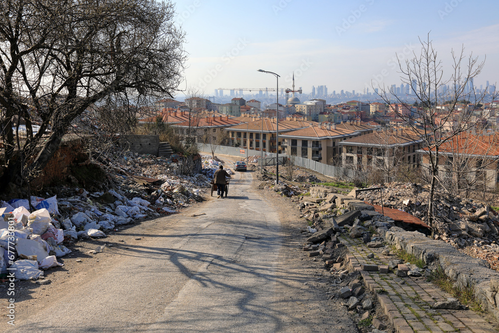 Top view of the future construction site. A road winding among the debris of demolished buildings and rubbish dumps. Uskudar district, Istanbul, Turkey Top view of the future construction site. A road winding among the debris of demolished buildings and rubbish dumps. Uskudar district, Istanbul, Turkey