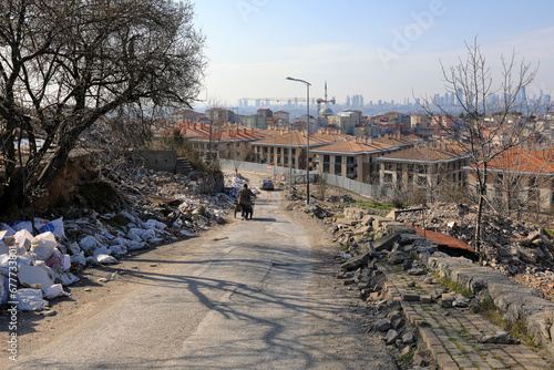 Top view of the future construction site. A road winding among the debris of demolished buildings and rubbish dumps. Uskudar district, Istanbul, Turkey