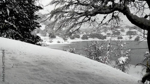 Beautiful shot of a snowy landscape in the Villa Pehuenia Neuquen village in Argentina photo