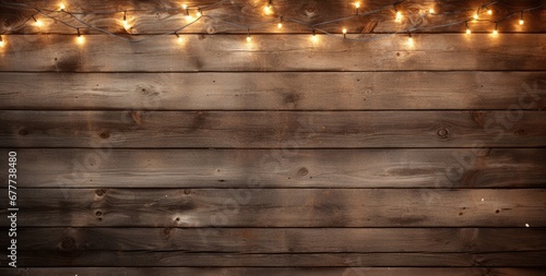  a close up of a wooden wall with a bunch of lights on it and a teddy bear sitting in front of it.