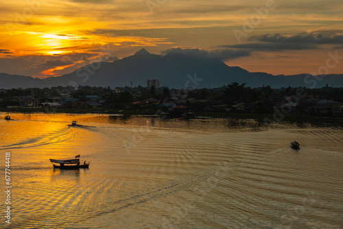 Obraz na plátně View of Kuching Waterfront Sarawak River during sunset