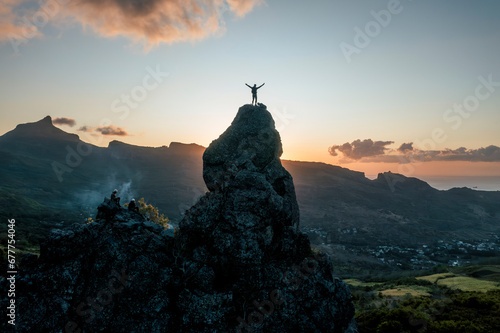 Aerial view of people climbing on Piton Jacob Peak mountain in Port Louis, Mauritius.