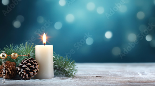 Christmas - Banner Of 1 candle and xmas ornament  Pine-cones And green Spruce Branches minimal blue background and lights in the back  with empty copy space