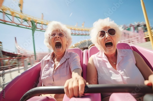 Portrait old women playing Roller Coaster at amusement park