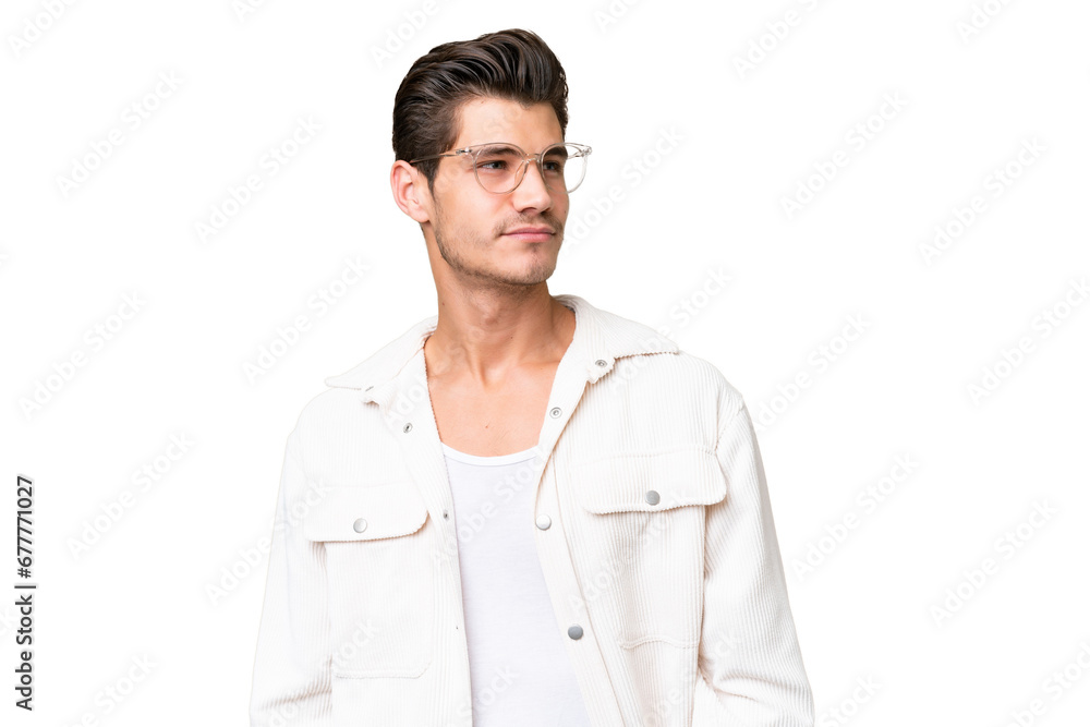 Young handsome caucasian man over isolated background looking to the side Young handsome caucasian man over isolated background looking to the side
