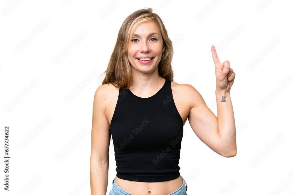 Young blonde woman over isolated background showing and lifting a finger in sign of the best Young blonde woman over isolated background showing and lifting a finger in sign of the best