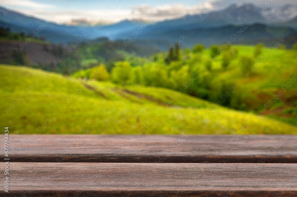 Wood blank table top in outdoors nature background.