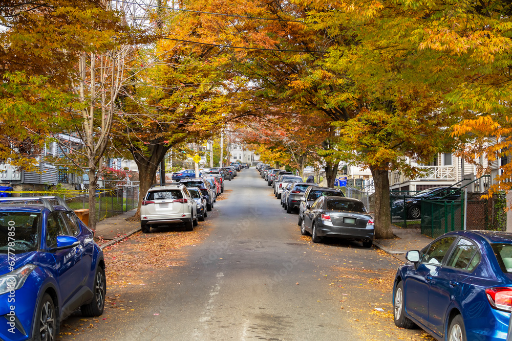 Φωτογραφία Residential street with parked cars in an autumn day, Brighton, Massachusetts, U