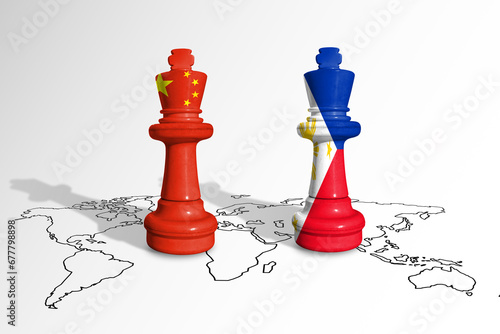 Chess made from China and Philippine flags on a world map. China and Philippine conflict photo