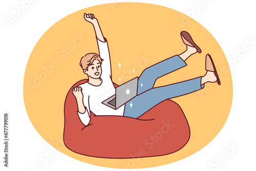 Happy young man sit on sofa triumph win lottery online on computer. Excited guy use laptop feel euphoric with good news online on victory. Vector illustration.