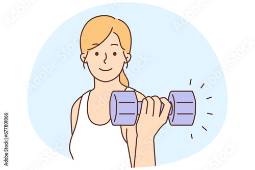 Happy woman training with dumbbells