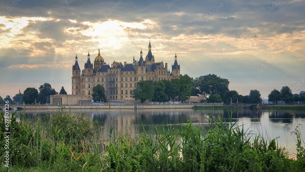 Castle by the lake at sunset