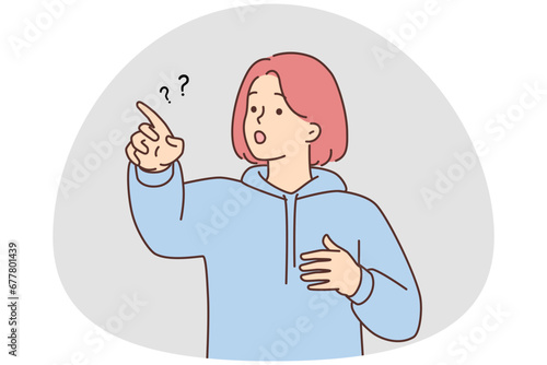 Frustrated girl point with finger at something